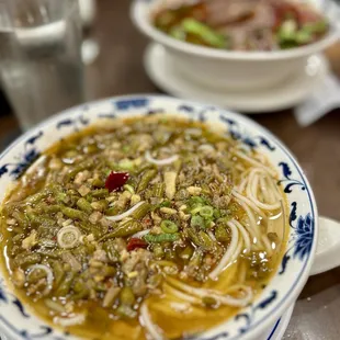 E11. Pickled String Bean &amp; Minced Pork Rice Noodle E13. Sichuan Spicy &amp; Beef Rice Noodle Soup