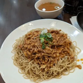 E6. Spicy Shredded Pork Over Noodles