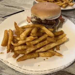 Angus burger with potato bun bacon and provolone cheese with fries