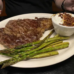 Ribeye with loaded mash and asparagus