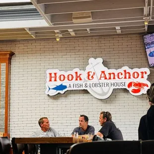 Inside w/hostess &amp; lots of TVs