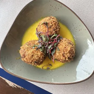 Happy hour halibut croquettes, eat this first, super light but delicious flavor.