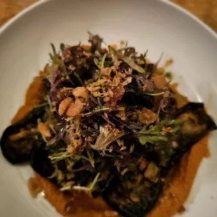 Grilled Eggplant [vegan] $24 - Listada eggplant, smoked almond romesco, preserved lemon, salsa verde, mustard greens