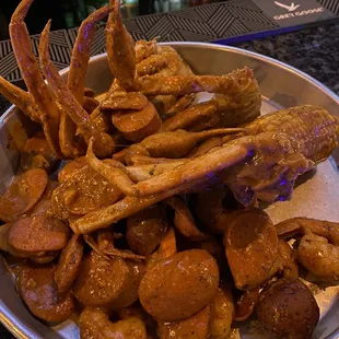 Snow Crab Leg (1 cluster) Shrimp (Head-off) 0.5lb Sausage Corn on the Cob (1) Potatoes (3) Hook Reel Special Blend (8 oz)