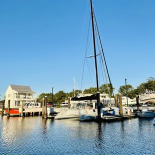 a sailboat docked at a dock