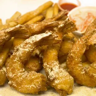 a plate of fried fish and fries