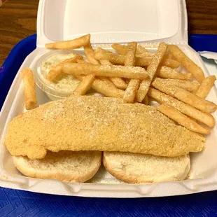 Catfish sandwich (the yellow stuff is the amazing earth shaking seasoning)