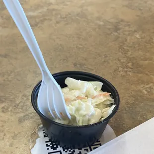 a fork in a bowl of food
