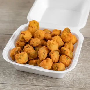 a container of fried shrimp