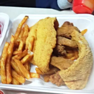 - "Catfish fillets, chicken wings and seasoned fries.