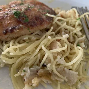 Half eaten order of Parmesan crusted chicken entree