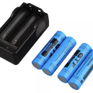 a battery charger and four aa batteries