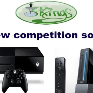 a video game console, a wii, and a game controller