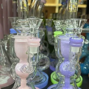 a variety of glass smoking pipes