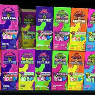 a large stack of colorful boxes