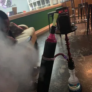 smoke coming out of a hookah