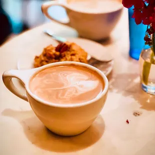 Americano with oat milk and a gluten free caramel pecan scone.