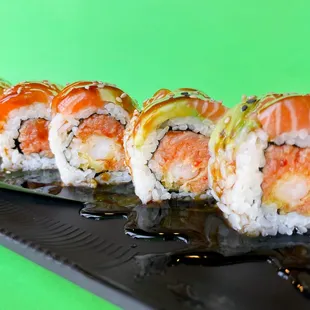 a row of sushi rolls