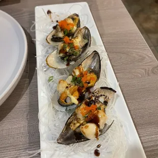 three musselling musselling on a plate