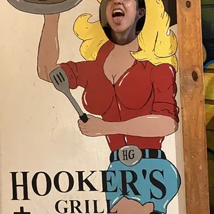 a woman holding a plate of food