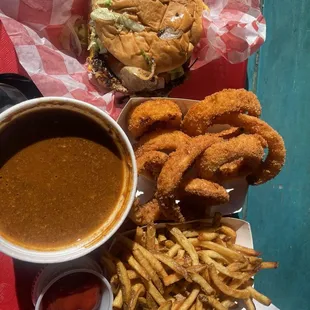 Burger , onion rings , fries and chilli