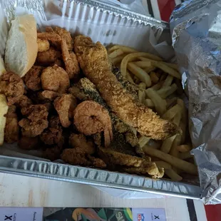The V.I.P plate Fish,Oys, SH LG FRIES &amp; hush puppies