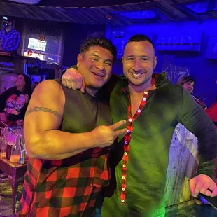 two men posing for a picture
