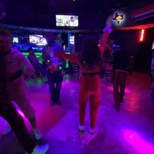 a group of people playing a video game