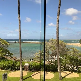 a view of the beach from a window