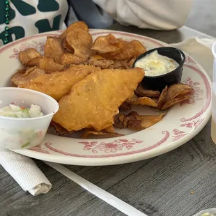 a plate of fried fish and chips