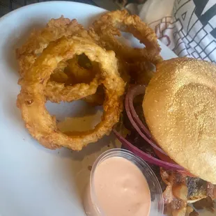a burger and onion rings