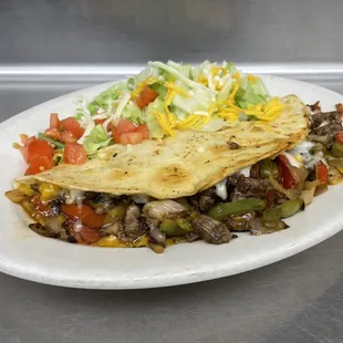 Steak Quesadilla add peppers and onions