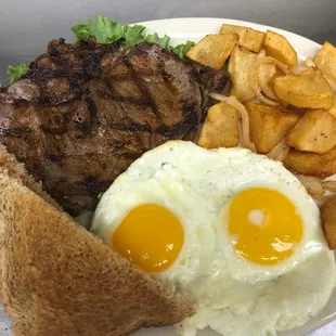 Steak Choice &amp; Eggs 
Ribeye, 2 eggs, fried potatoes with onions, and toast