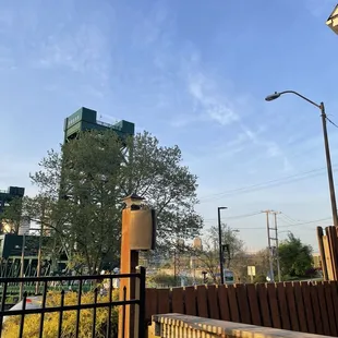 a view of a city from a fence