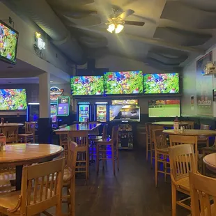 View towards the back of the restaurant.  Plenty of seating and lots of big screen TVs