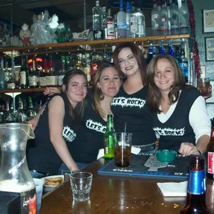 a group of women at a bar