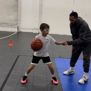 Coach Nate training to keep the ball high.