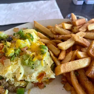 Veggie omelet and fries