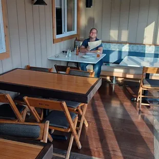 a woman sitting at a table