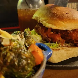 Buffalo chicken sandwich with fancy pork belly brussel sprouts