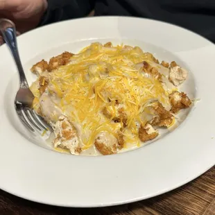 Hoosier Routes Bowl - taters, chicken, gravy (brown or white), &amp; cheese. Comes with soup or salad and green beans.