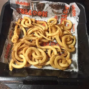 This is suppose to be TWO ORDERS of curly fries. You be the judge.