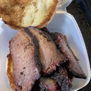 A lot of brisket on the sandwich.