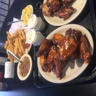 Smoked wings, large fries, Charro Beans, Mac and Cheese