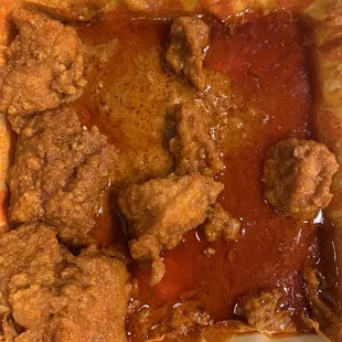 a dish of meat and sauce