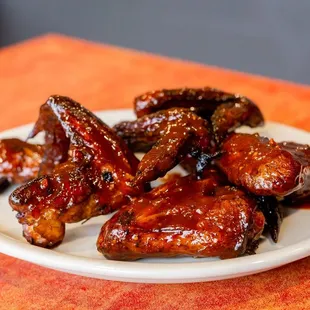 a plate of chicken wings