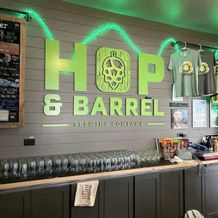 a bar with green lights