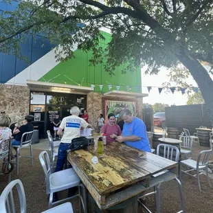 The patio beer garden eating breakfast tacos