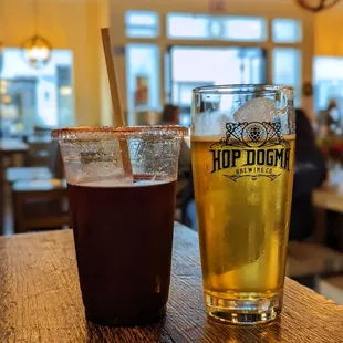 two glasses of beer on a table