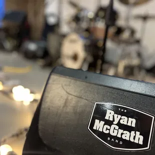 a drum set in the background